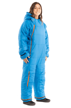 Adult woman in a Selk'bag wearable sleeping bag in blue