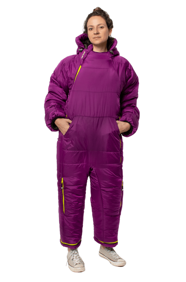 Adult woman wearing a purple Selk'bag sleeping bag suit